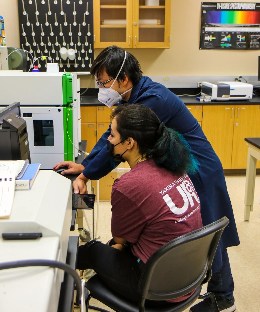 Instructor and student in lab