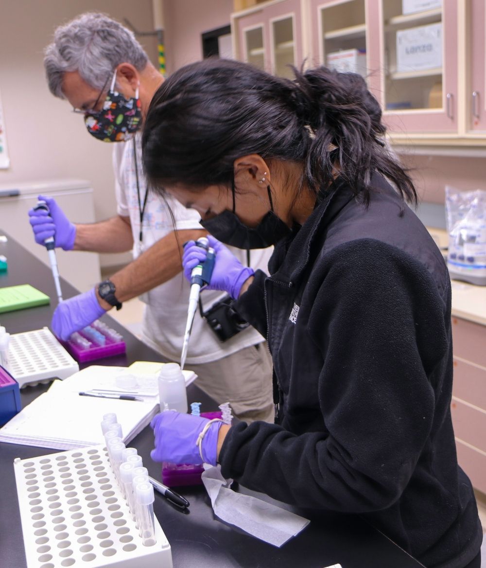 Student and instructor in lab