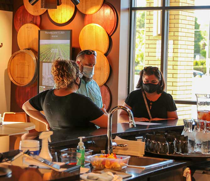 Annette Wattenberger helps customers in the Yakima Tasting Room