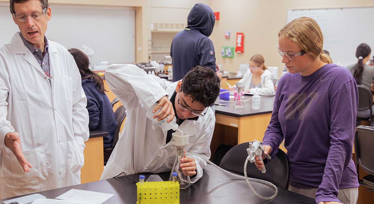 Student works on a experiment in biology lab