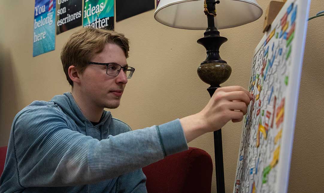 Student works on a word board in YVC's Writing Center