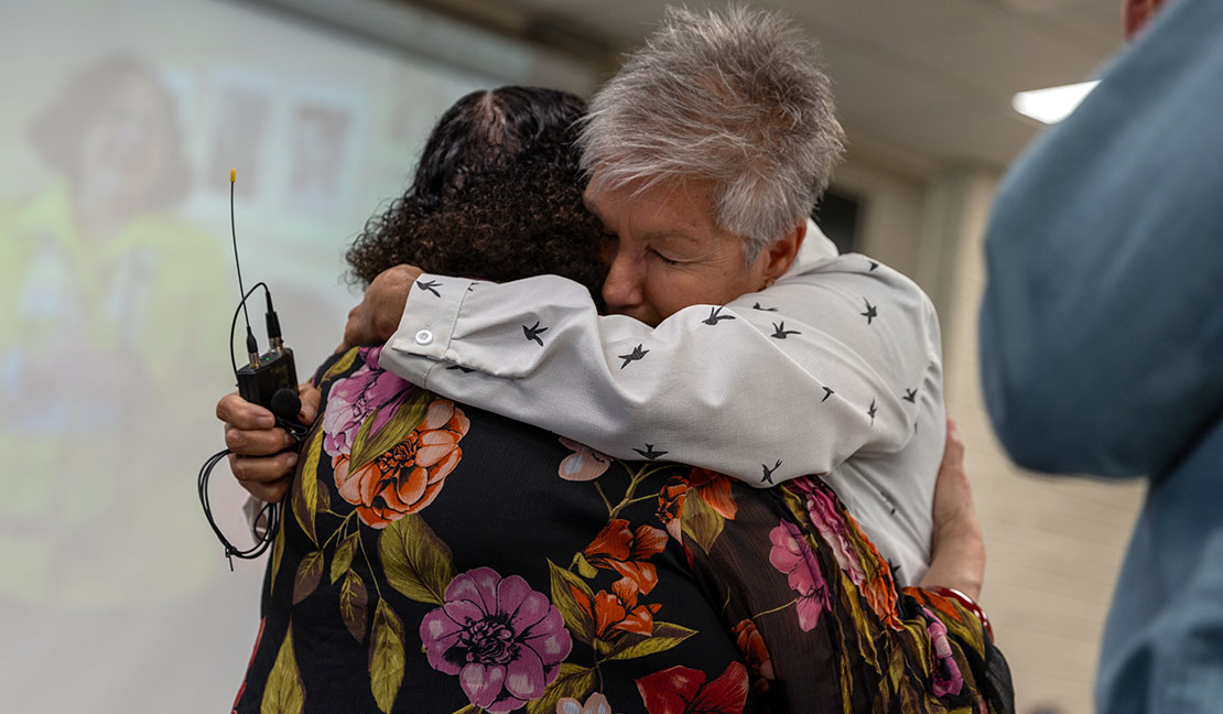 Teresa Rich hugs Linda Kaminski