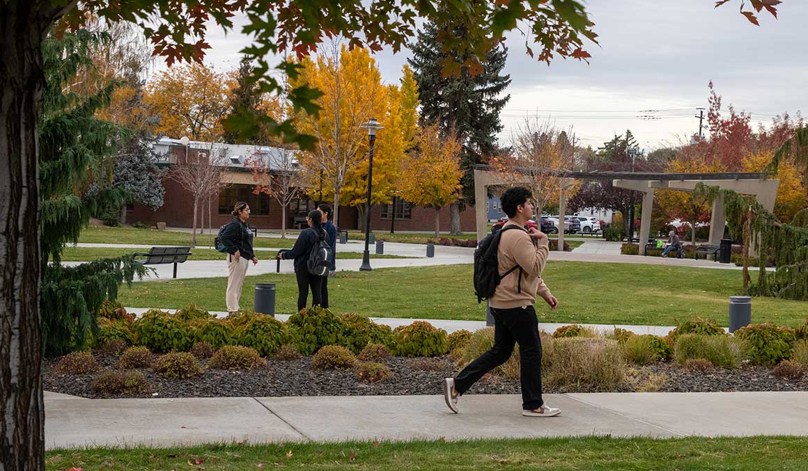 Students walk in YVC's courtyard in the fall