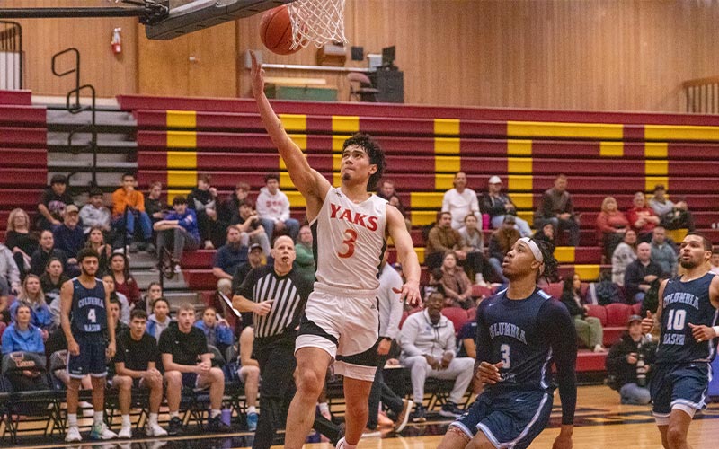 YVC men's basketball player Jose Brown attempts layup