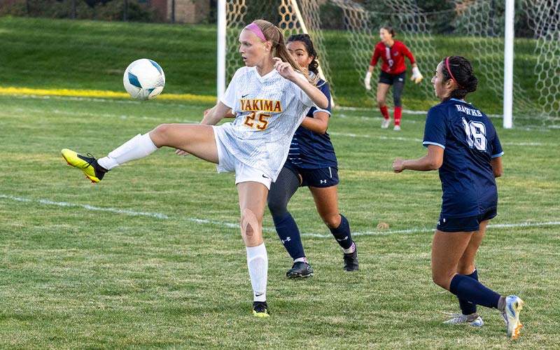 Yakima Valley College women's soccer player with ball