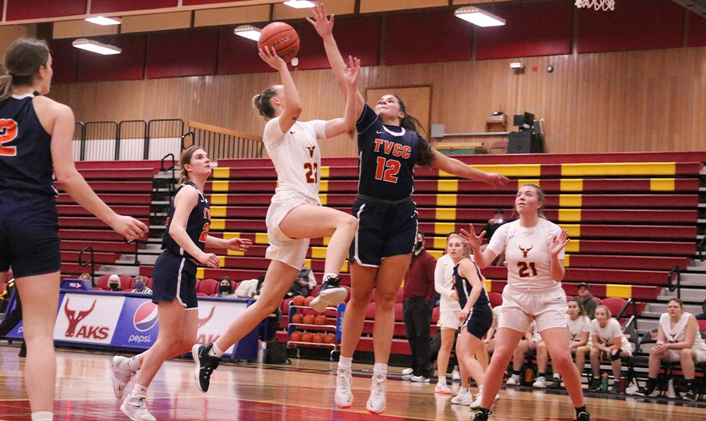 Female basketball player taking shot