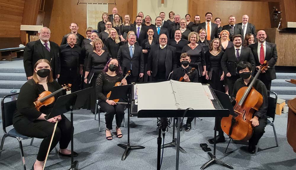 Choir and string instrument musicians.