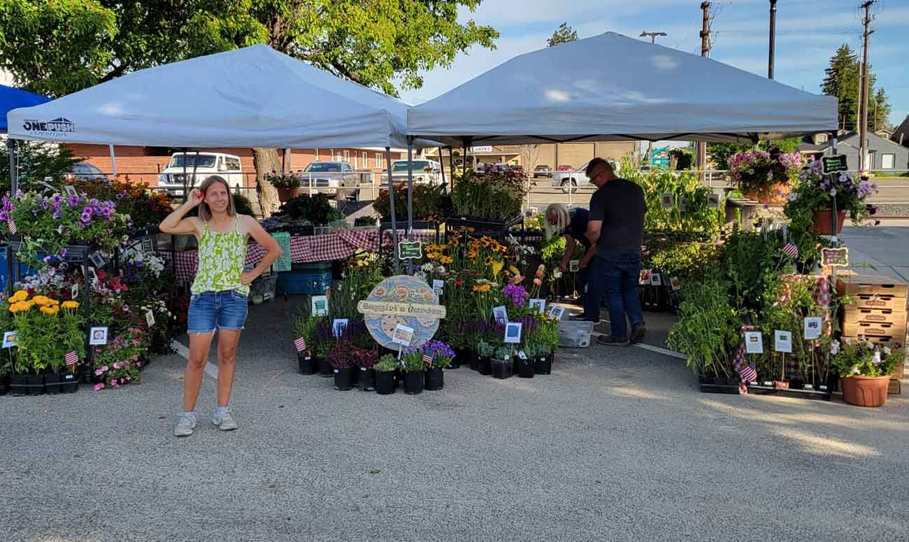 Gingras poses for a photo during a market in Prosser, Wash.