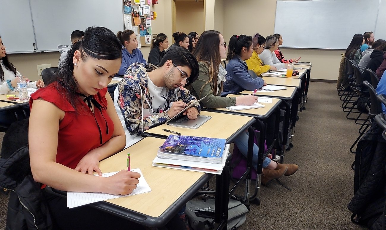 Students sitting as desks