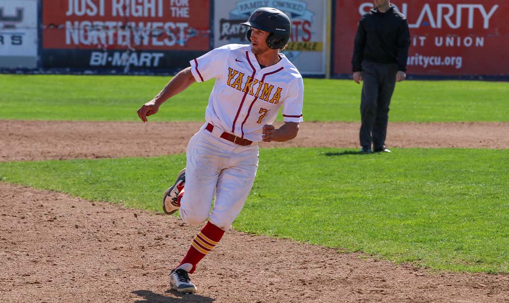 Baseball player runs bases