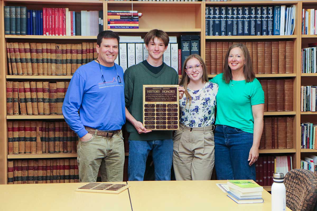 Peters with his family during the award presentation.