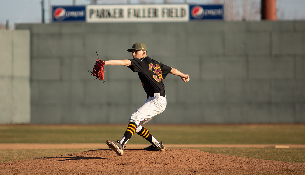 Baseball pitcher winds up