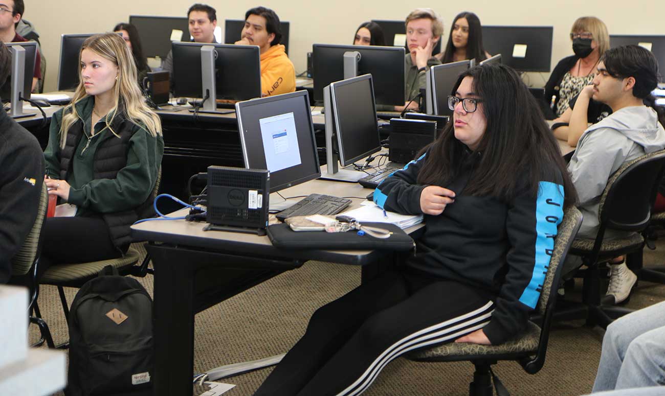 Students listen to a history presentation