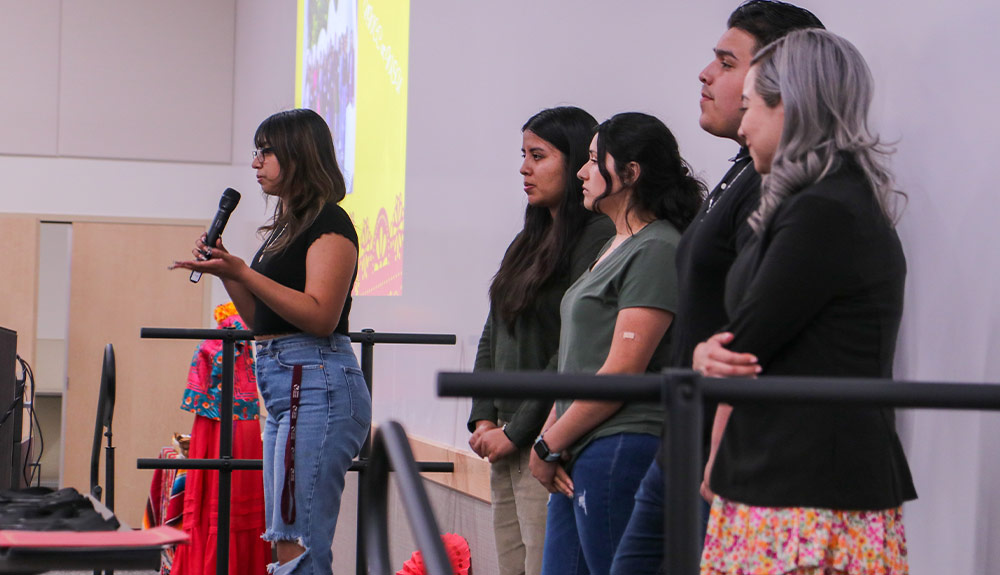 Student with microphone speaks