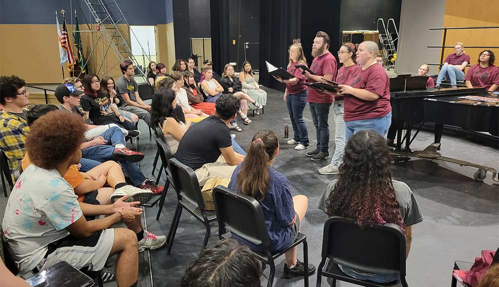 Choir members rehearse