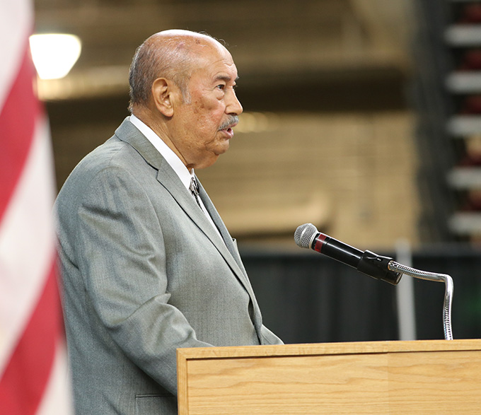 Ricardo Garcia speaks at the podium.