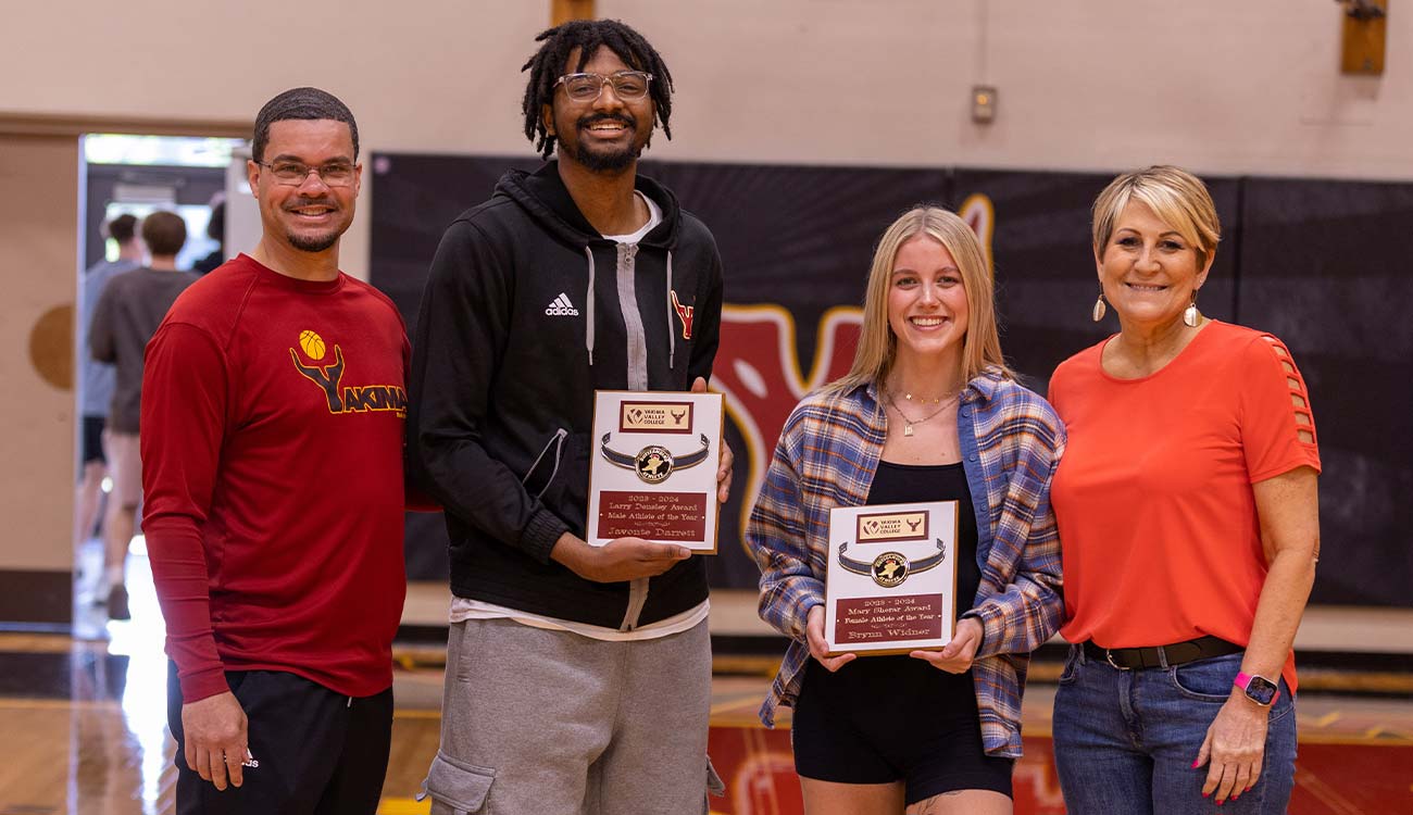 YVC athletes of the year Javonte Darrett and Brynn Widner with their coaches London Wilson and Darci Dekker