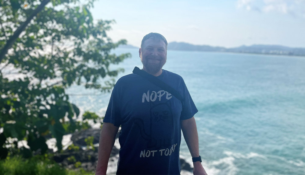 Brock Eubanks with Pacific Ocean in background