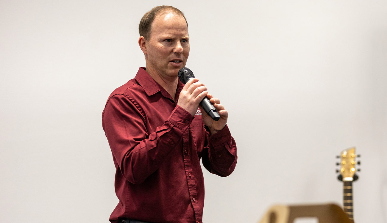 YVC Faculty member Trent Ball addresses audience. 