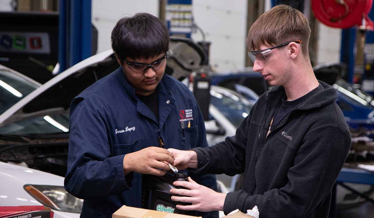 Students in YVC's Automotive Service Technology program work on a project in lab