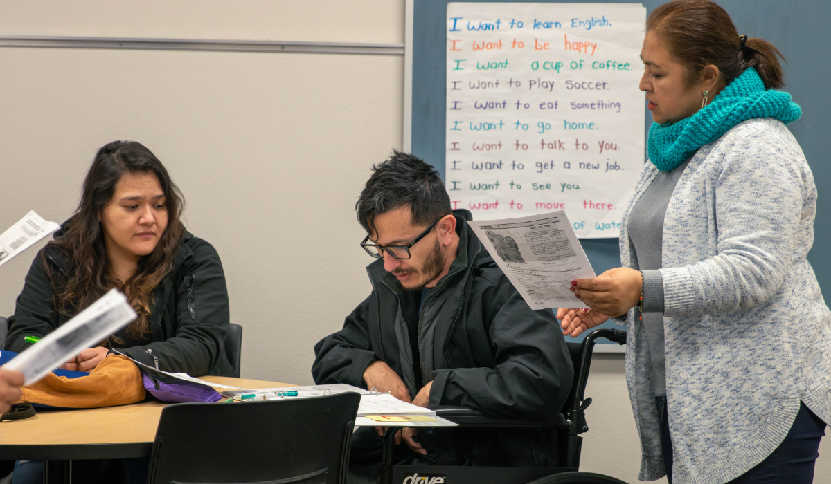 Students listen to instructor during class