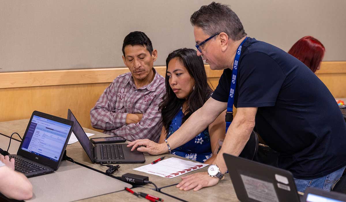 A student gets help during an Express Enrollment event