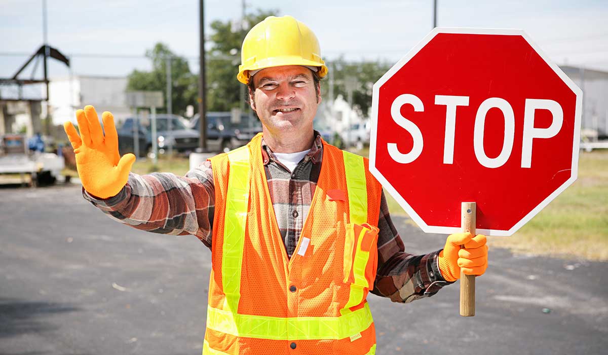 Flagger holding a stop sign