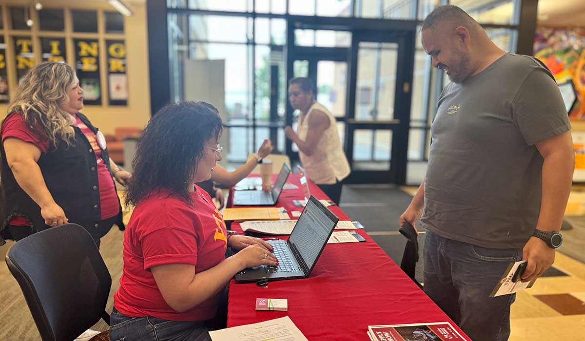 A student gets help during an Express Enrollment event