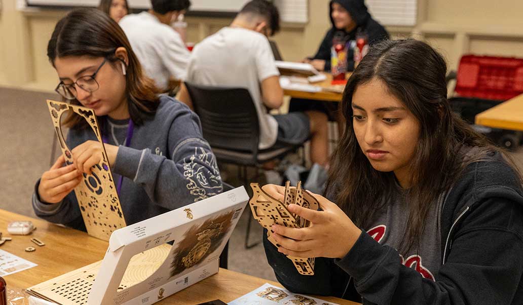 Engineering students work on a project