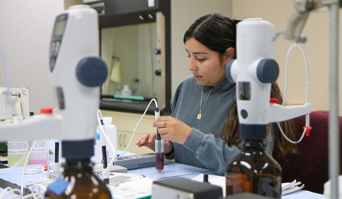 A student in lab for the BASAG program