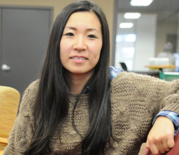 Miho Kobayashi poses for Student Story picture in YVC academic building. 