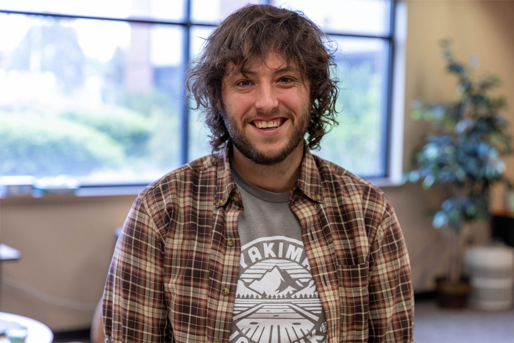 Jordan Sheeres poses for Student Profile picture inside YVC academic building. 