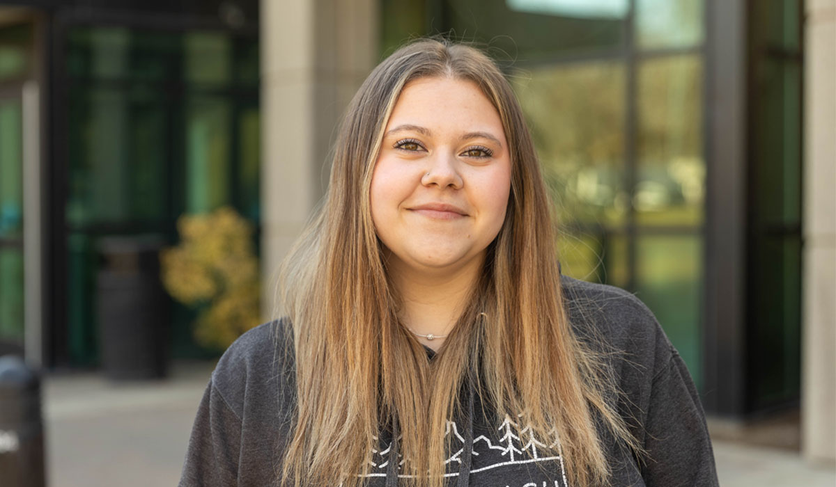 Zoe Harrington Poses for Student Story Picture on the YVC Campus.